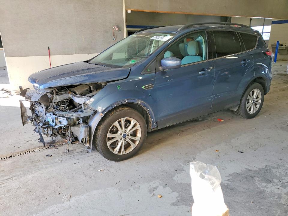 FORD ESCAPE SE 2018 with VIN 1FMCU9GDXJUA72991 - Photo from auction