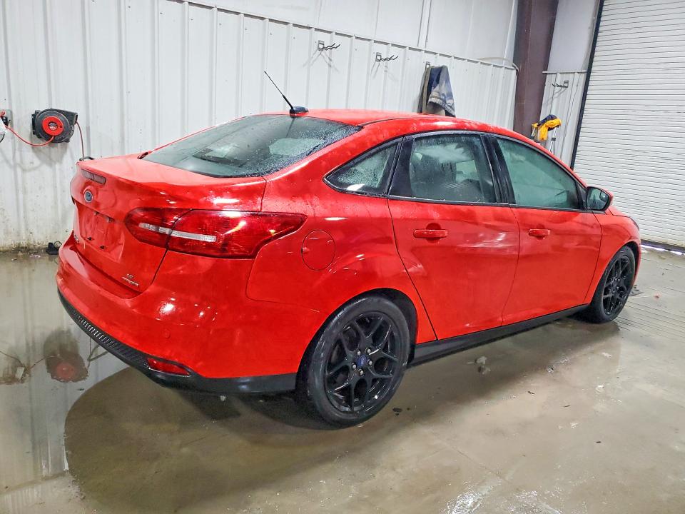 Photo 3 from auction – 2016 FORD FOCUS SE with VIN 1FADP3F23GL205463