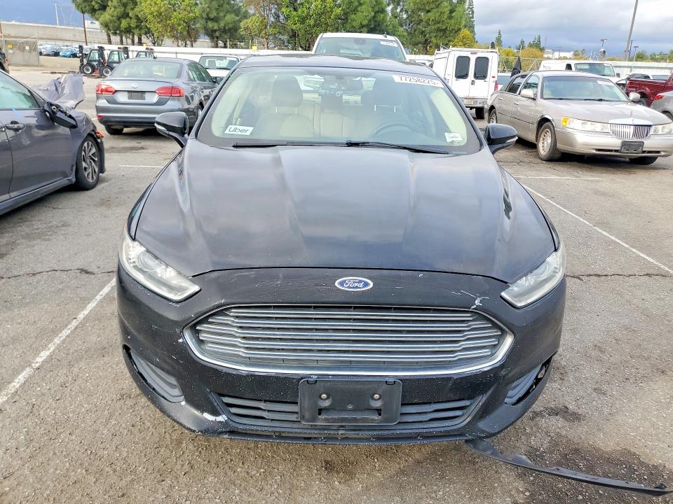Photo 5 from auction – 2016 FORD FUSION with VIN 3FA6P0LUXGR389346