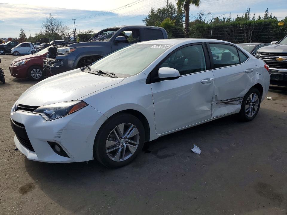 TOYOTA COROLLA 2014 with VIN 5YFBPRHEXEP145021 - Photo from auction