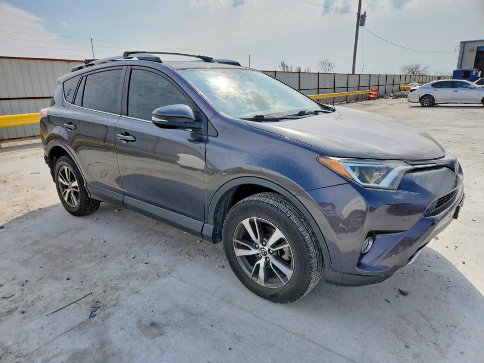 Photo 4 from auction – 2016 TOYOTA RAV4 with VIN JTMWFREV4GJ080263