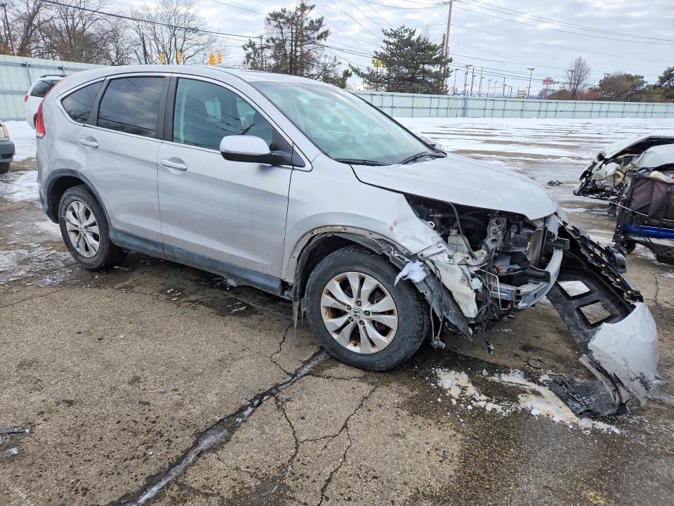 Photo 4 from auction – 2012 HONDA CR-V with VIN 3CZRM3H58CG701554