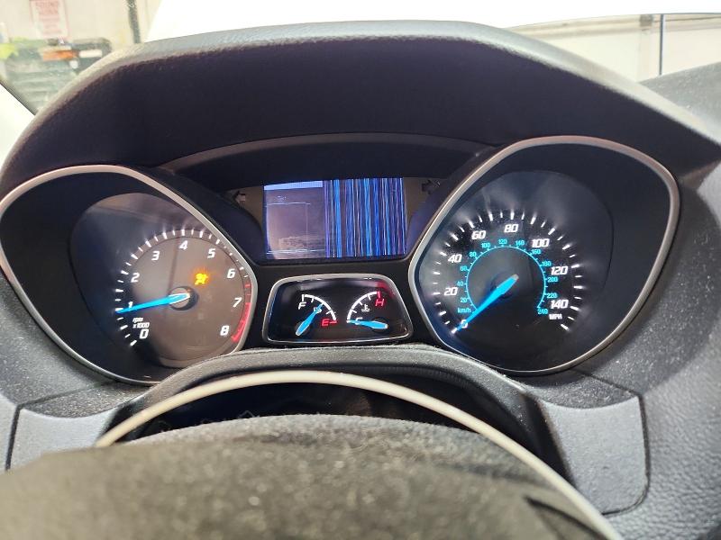 Photo 9 from auction – 2014 FORD FOCUS with VIN 1FADP3F22EL105920