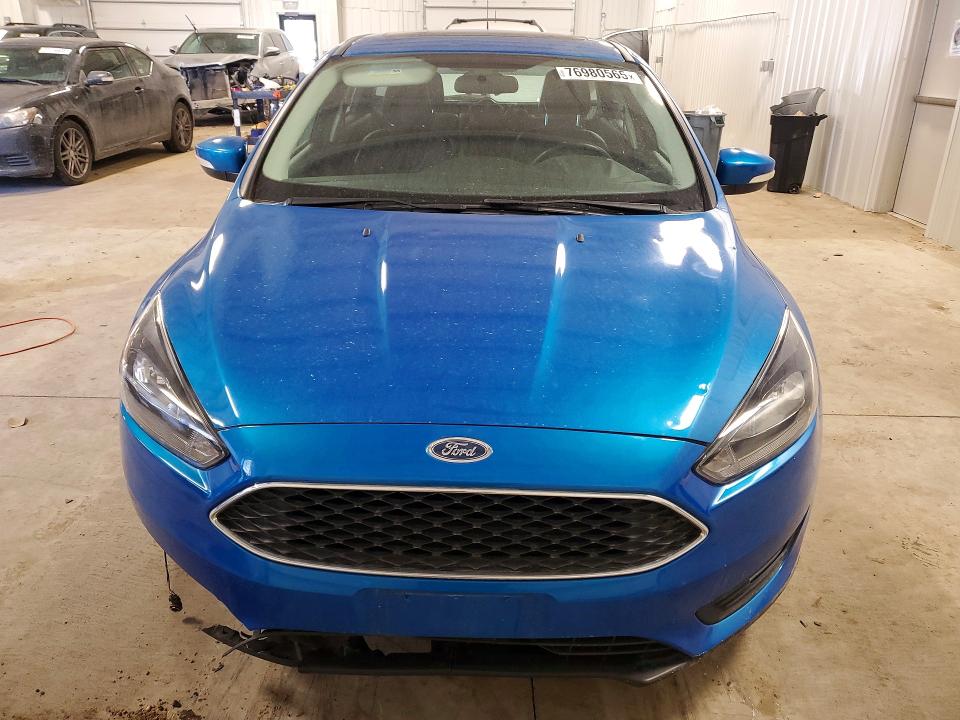Photo 5 from auction – 2015 FORD FOCUS with VIN 1FADP3K25FL382813