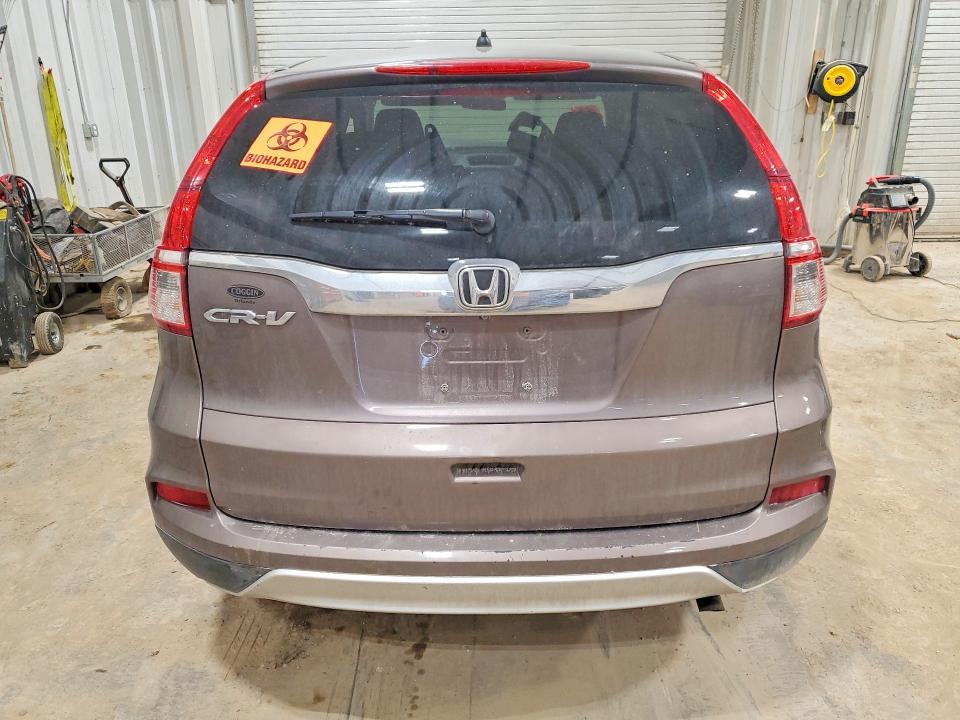 Photo 6 from auction – 2015 HONDA CR-V with VIN 3CZRM3H50FG705358