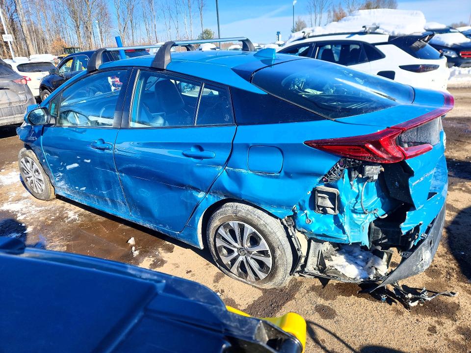 Photo 2 from auction – 2021 TOYOTA PRIUS PRIM with VIN JTDKAMFPXM3175281