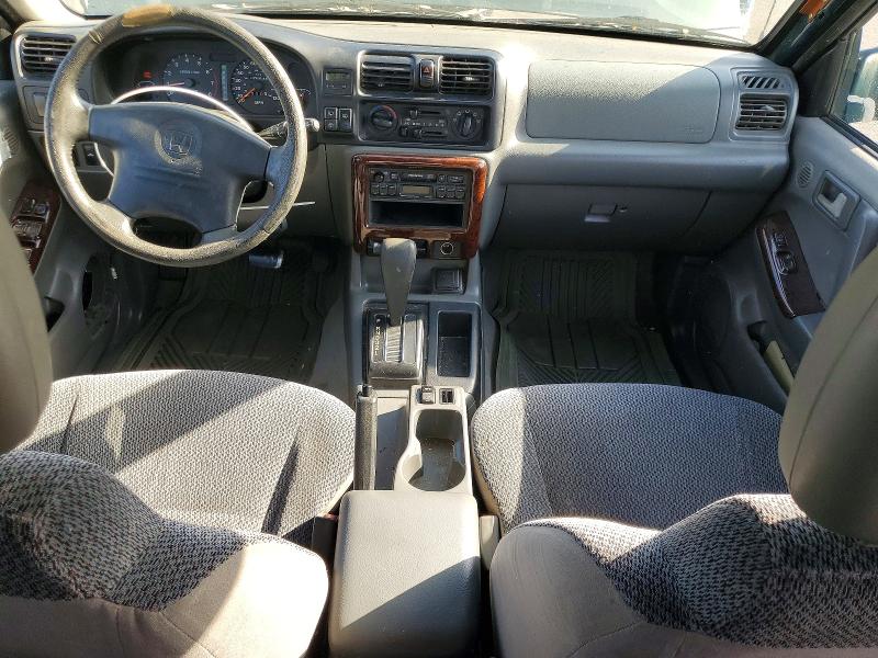 Photo 8 from auction – 1999 HONDA PASSPORT E with VIN 4S6CK58W4X4413669