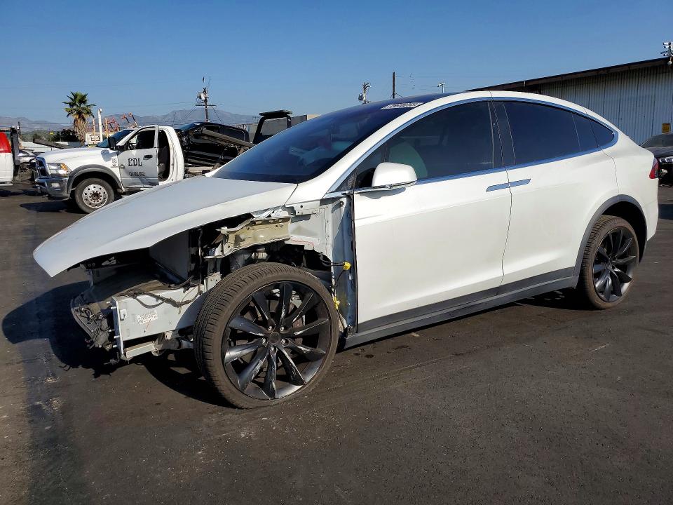TESLA MODEL X 2018 with VIN 5YJXCBE29JF144922 - Photo from auction