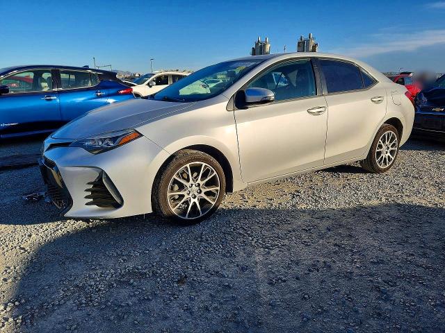 TOYOTA COROLLA 2017 with VIN 5YFBURHE3HP638486 - Photo from auction