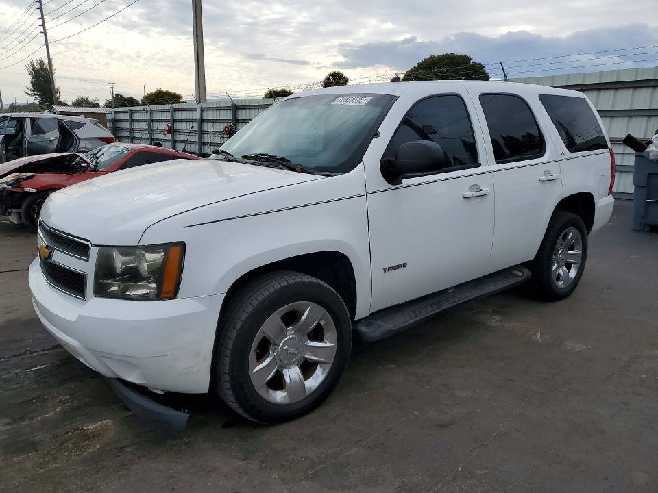 CHEVROLET TAHOE 2011 with VIN 1GNSK2E0XBR216239 - Photo from auction