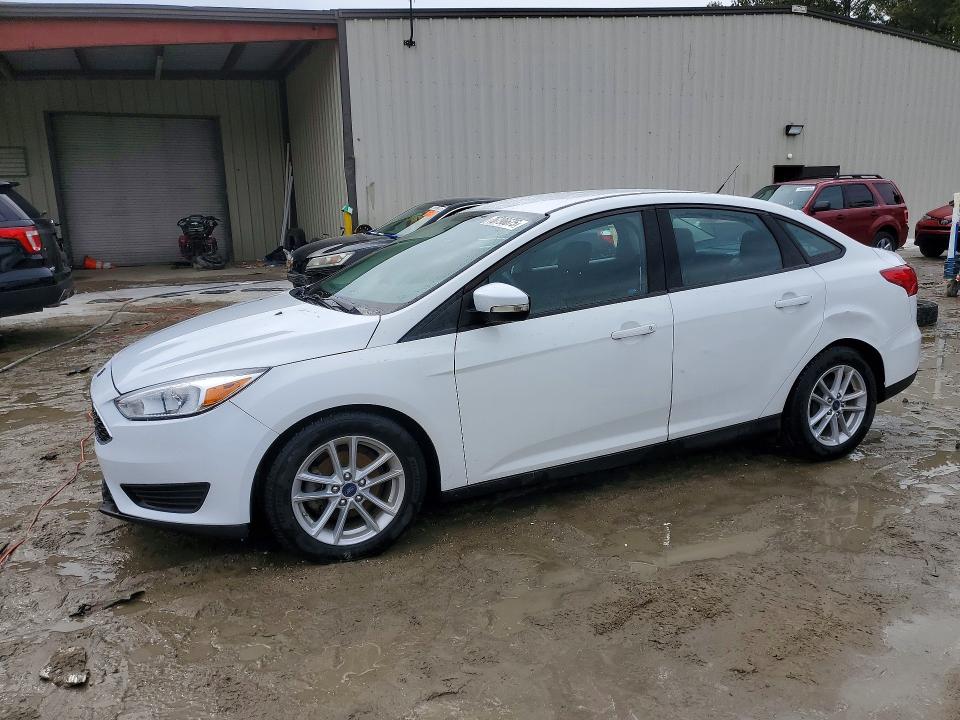 FORD FOCUS SE 2017 with VIN 1FADP3F25HL345998 - Photo from auction
