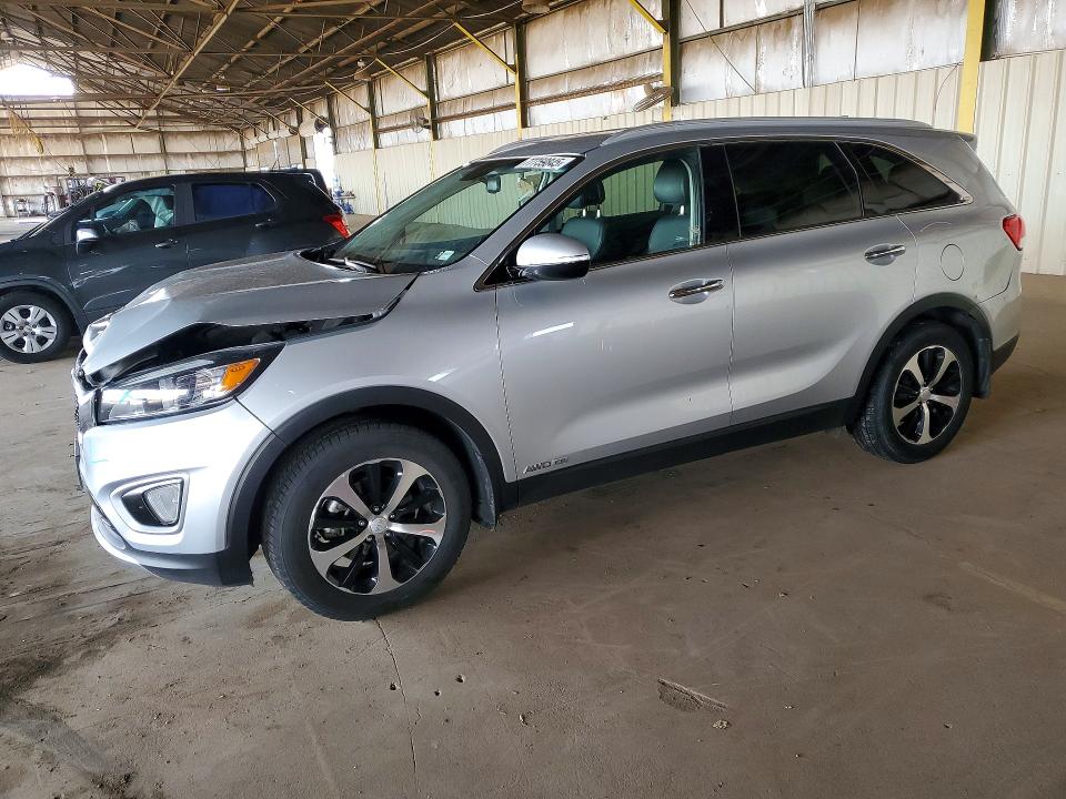 KIA SORENTO 2016 with VIN 5XYPHDA59GG161461 - Photo from auction