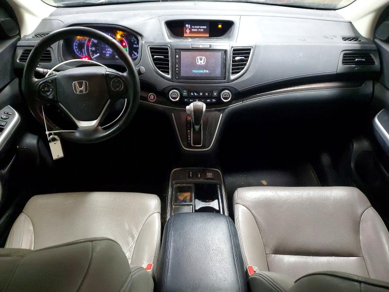 Photo 8 from auction – 2015 HONDA CR-V with VIN 5J6RM4H70FL006791