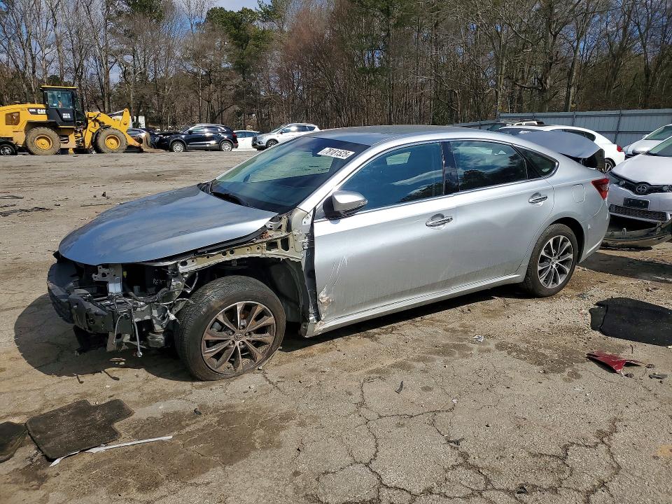 TOYOTA AVALON 2016 with VIN 4T1BK1EB1GU210883 - Photo from auction