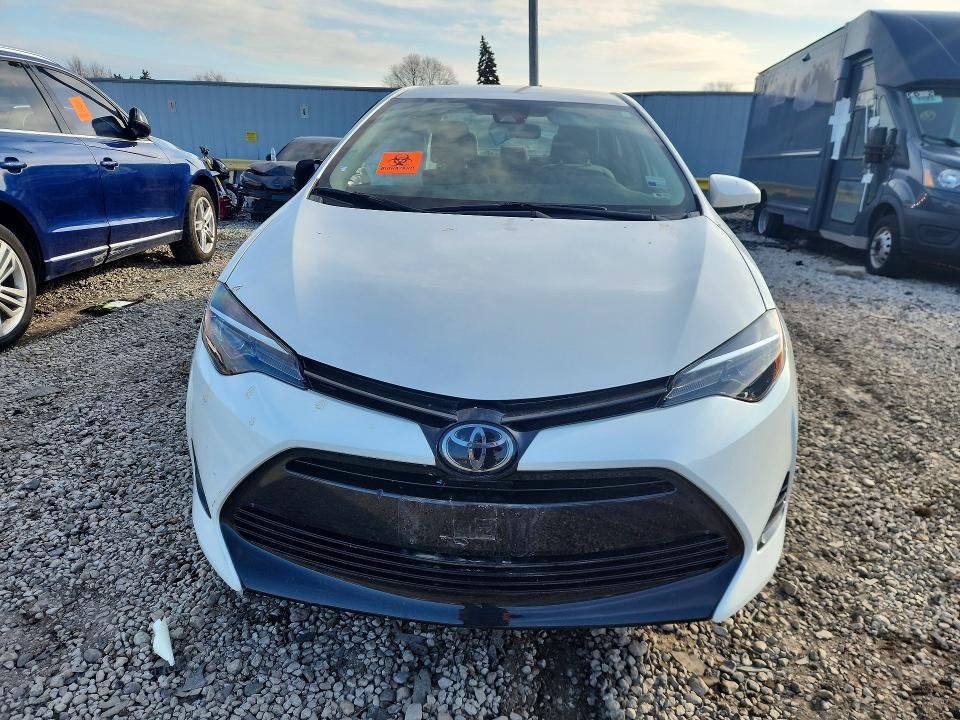 Photo 5 from auction – 2017 TOYOTA COROLLA with VIN 5YFBURHE1HP724024