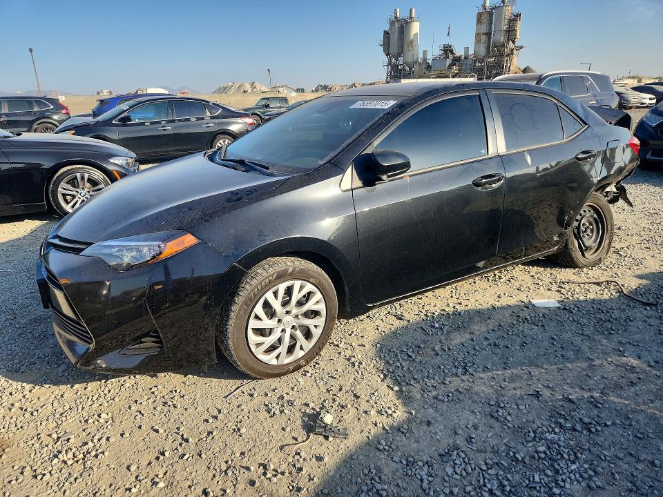 TOYOTA COROLLA 2017 with VIN 2T1BURHE2HC934857 - Photo from auction