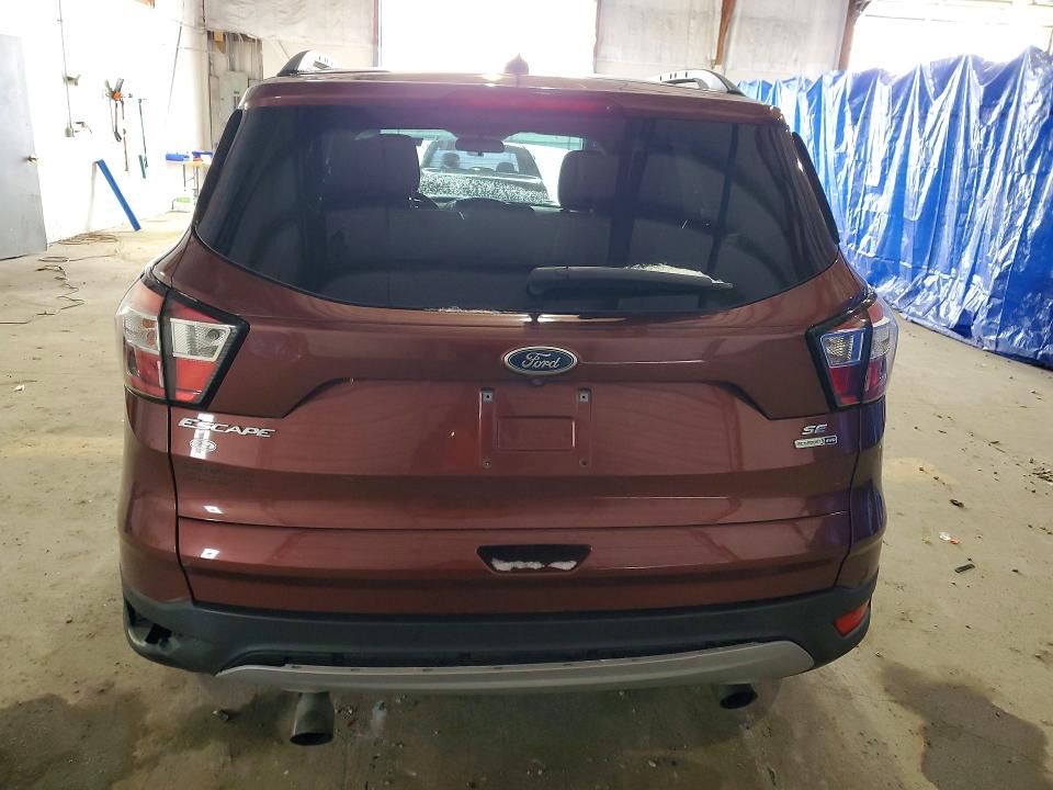 Photo 6 from auction – 2018 FORD ESCAPE with VIN 1FMCU9GD0JUC40914