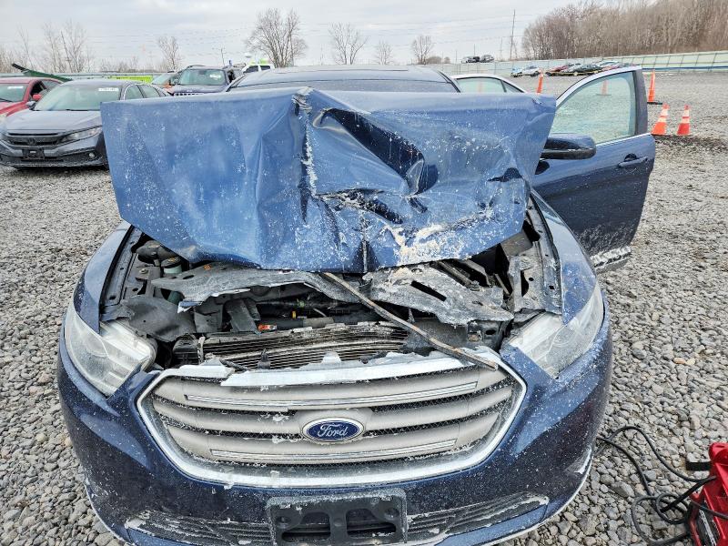 Photo 11 from auction – 2016 FORD TAURUS with VIN 1FAHP2E8XGG107539