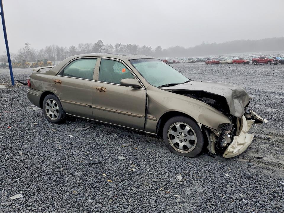 Photo 4 from auction – 2001 MAZDA 626 with VIN 1YVGF22C815237138
