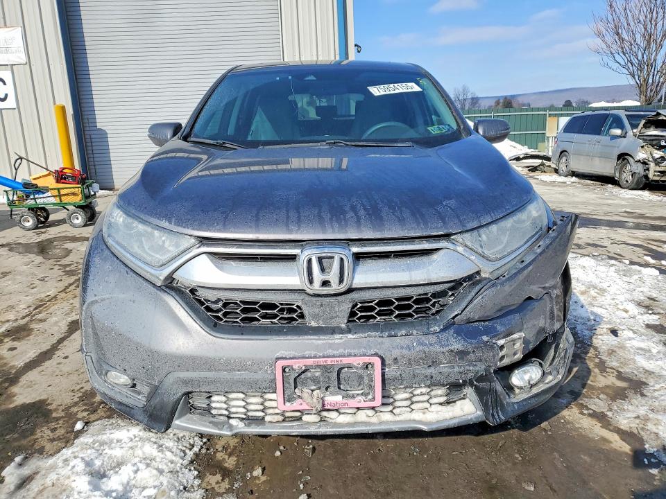 Photo 5 from auction – 2018 HONDA CR-V with VIN 7FARW2H56JE103870