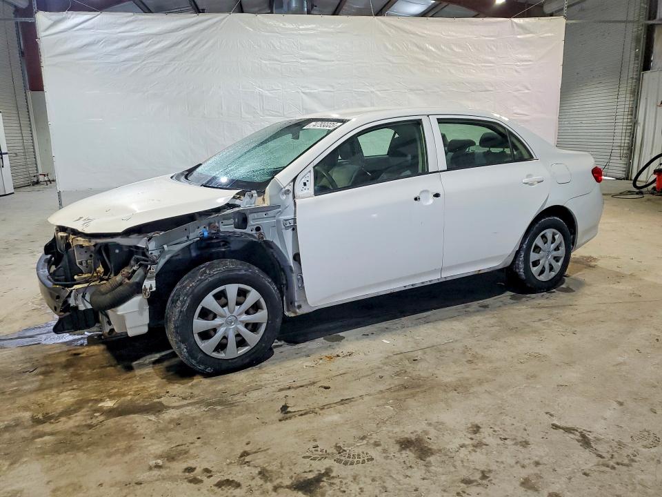 TOYOTA COROLLA 2010 with VIN JTDBU4EE5A9097556 - Photo from auction