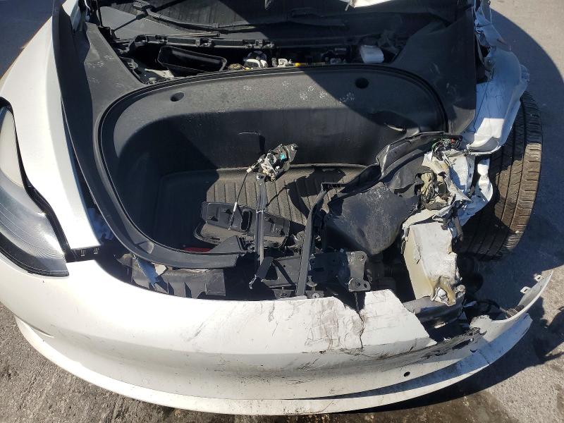 Photo 11 from auction – 2021 TESLA MODEL 3 with VIN 5YJ3E1EB0MF034123