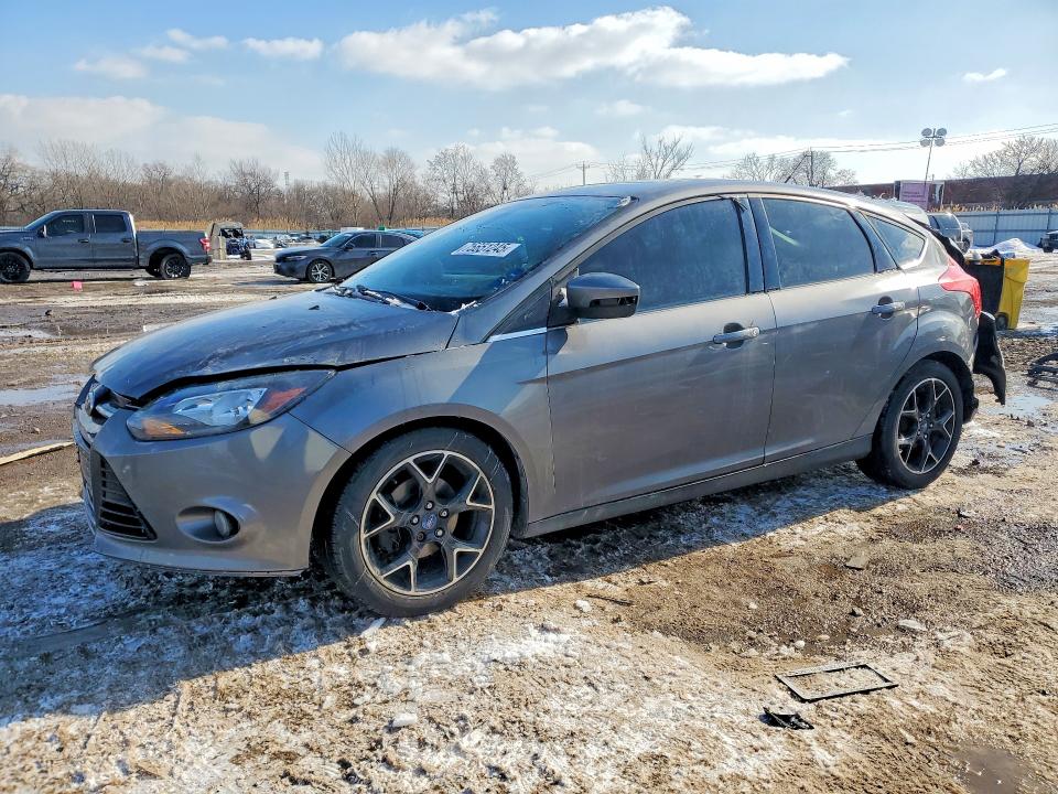 FORD FOCUS TITA 2012 with VIN 1FAHP3N21CL414228 - Photo from auction