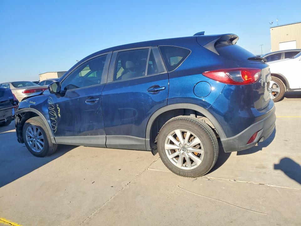 Photo 2 from auction – 2014 MAZDA CX-5 with VIN JM3KE2CY3E0411592