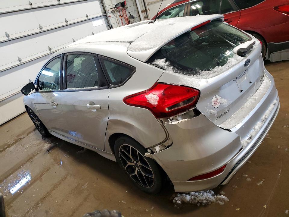 Photo 2 from auction – 2016 FORD FOCUS with VIN 1FADP3K22GL249041