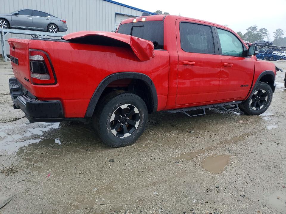 Photo 3 from auction – 2021 RAM 1500 with VIN 1C6SRFLT0MN759092