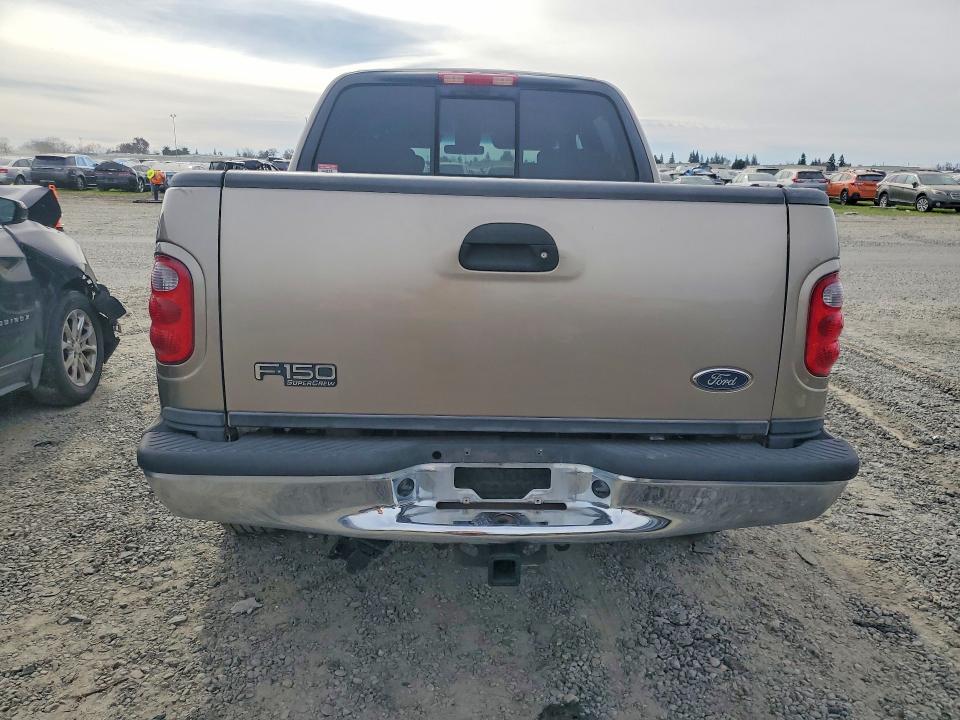 Photo 6 from auction – 2002 FORD F150 with VIN 1FTRW07L52KE32323