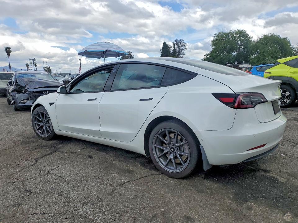 Photo 2 from auction – 2021 TESLA MODEL 3 with VIN 5YJ3E1EA3MF867731