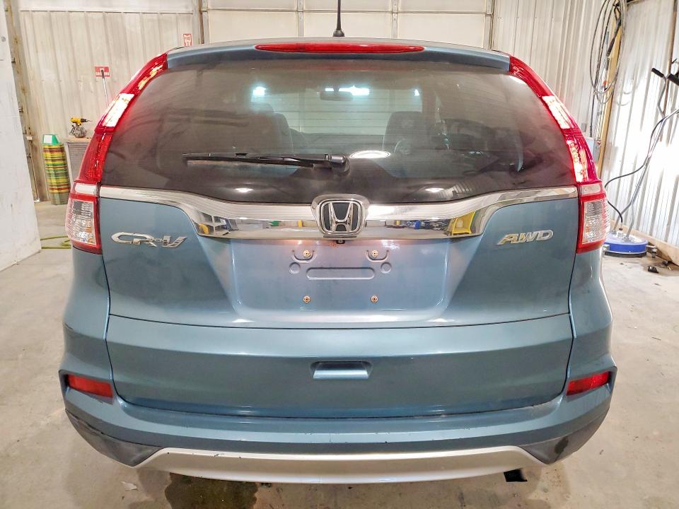 Photo 6 from auction – 2015 HONDA CR-V EX with VIN 2HKRM4H59FH617251