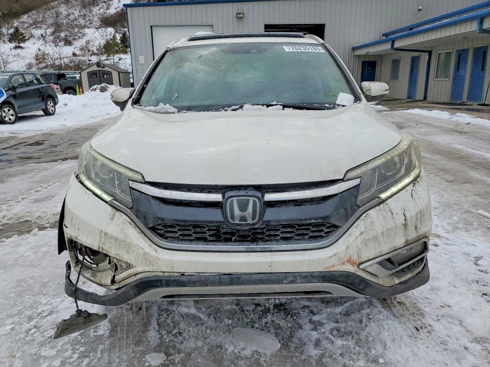 Photo 5 from auction – 2016 HONDA CR-V with VIN 5J6RM4H98GL013832