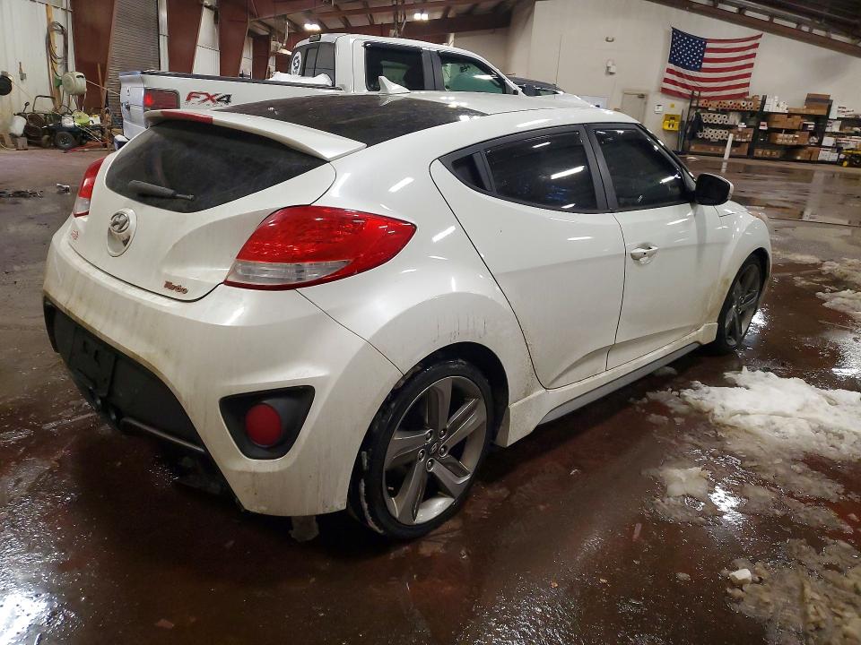 Photo 3 from auction – 2013 HYUNDAI VELOSTER with VIN KMHTC6AE6DU140565