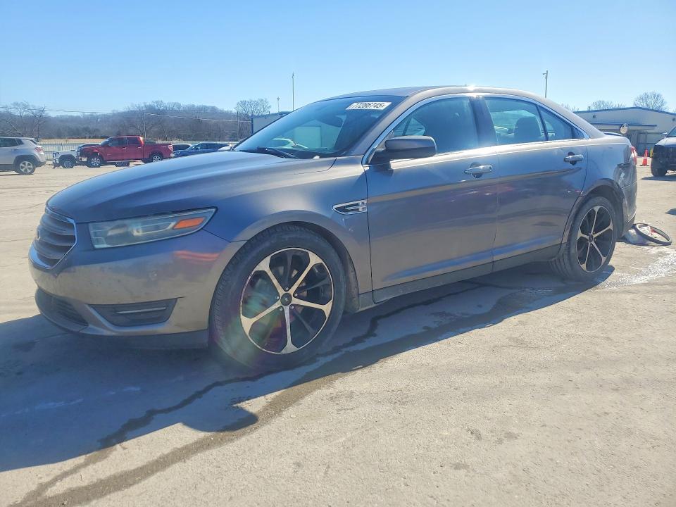 FORD TAURUS 2014 with VIN 1FAHP2E81EG140264 - Photo from auction