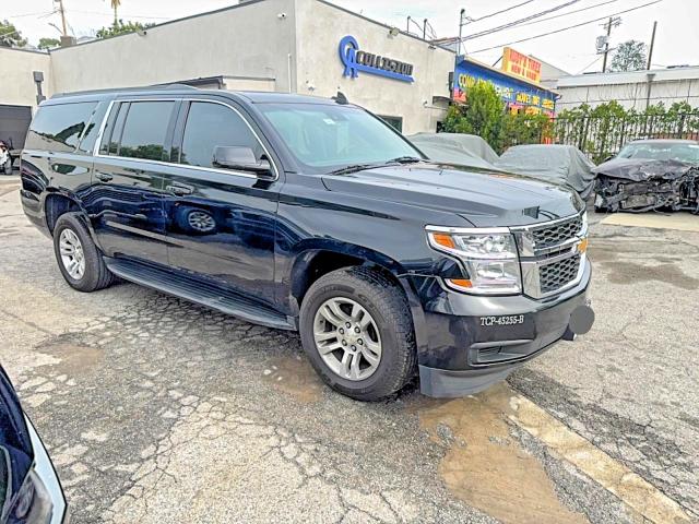 CHEVROLET SUBURBAN 2020 with VIN 1GNSKHKC9LR249221 - Photo from auction