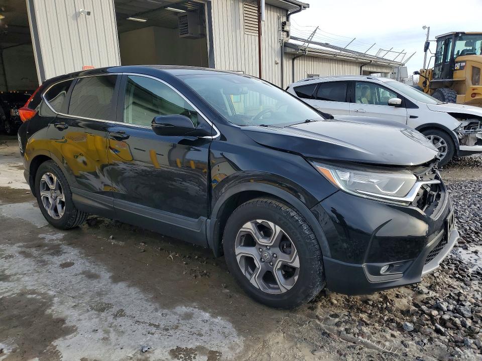 Photo 4 from auction – 2019 HONDA CR-V with VIN 2HKRW1H87KH513130