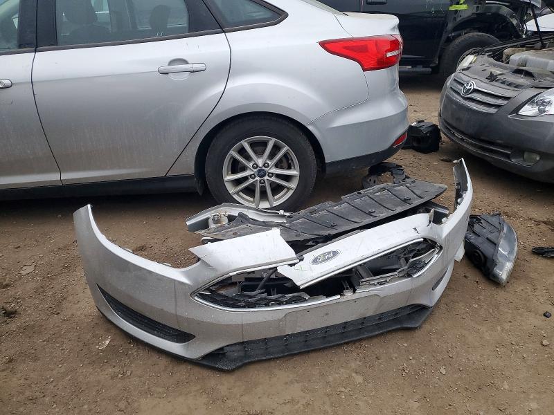 Photo 12 from auction – 2018 FORD FOCUS with VIN 1FADP3FEXJL286401