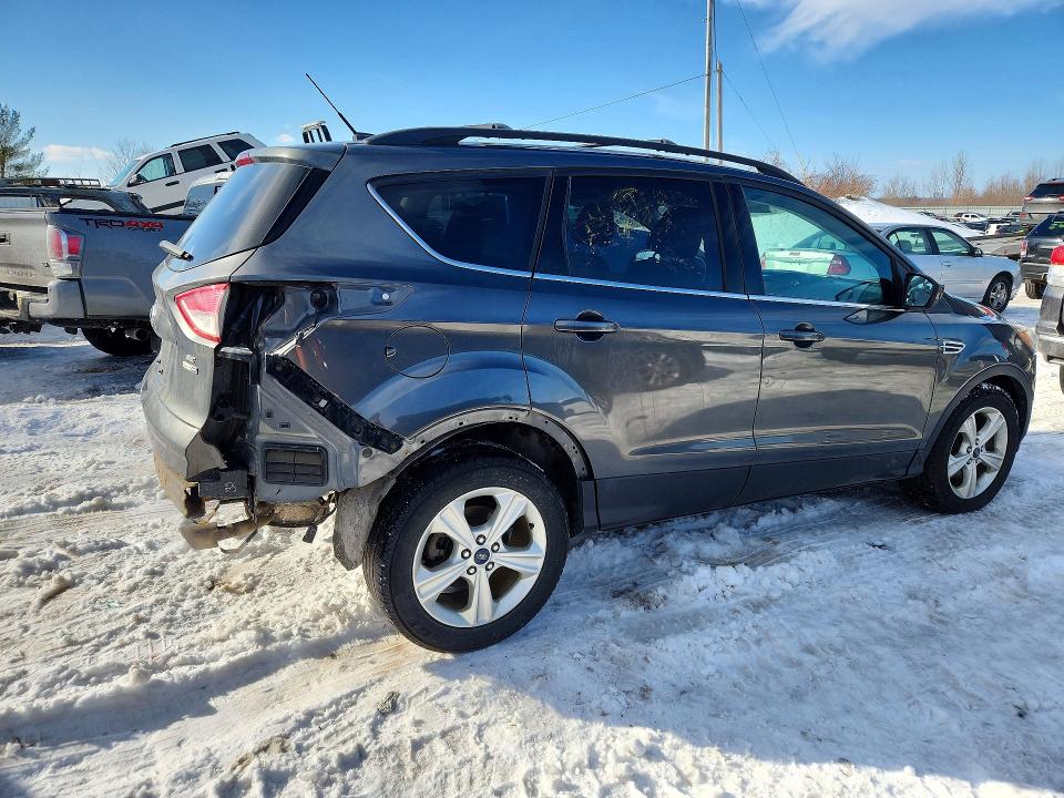 Photo 3 from auction – 2015 FORD ESCAPE SE with VIN 1FMCU9GX9FUB35399