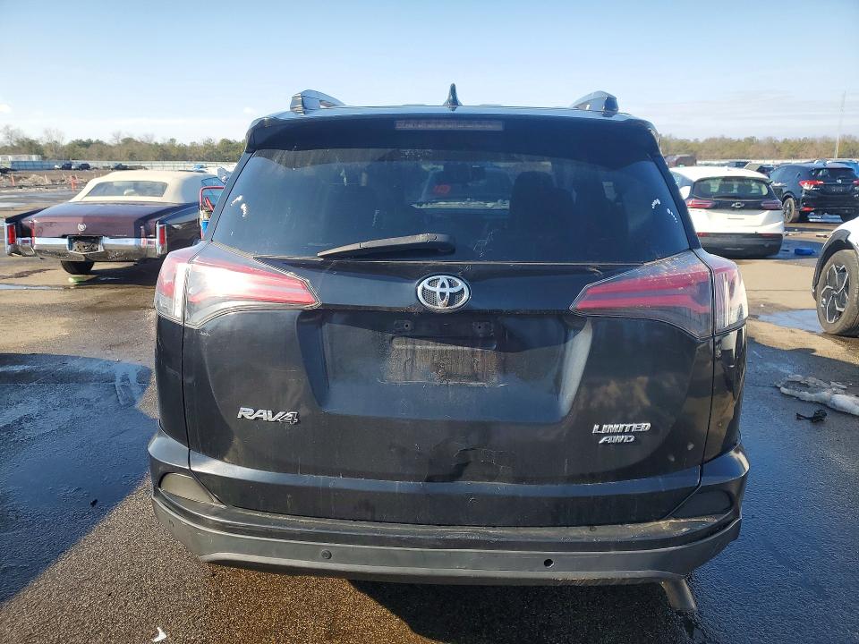 Photo 6 from auction – 2018 TOYOTA RAV4 with VIN 2T3DFREV7JW764773