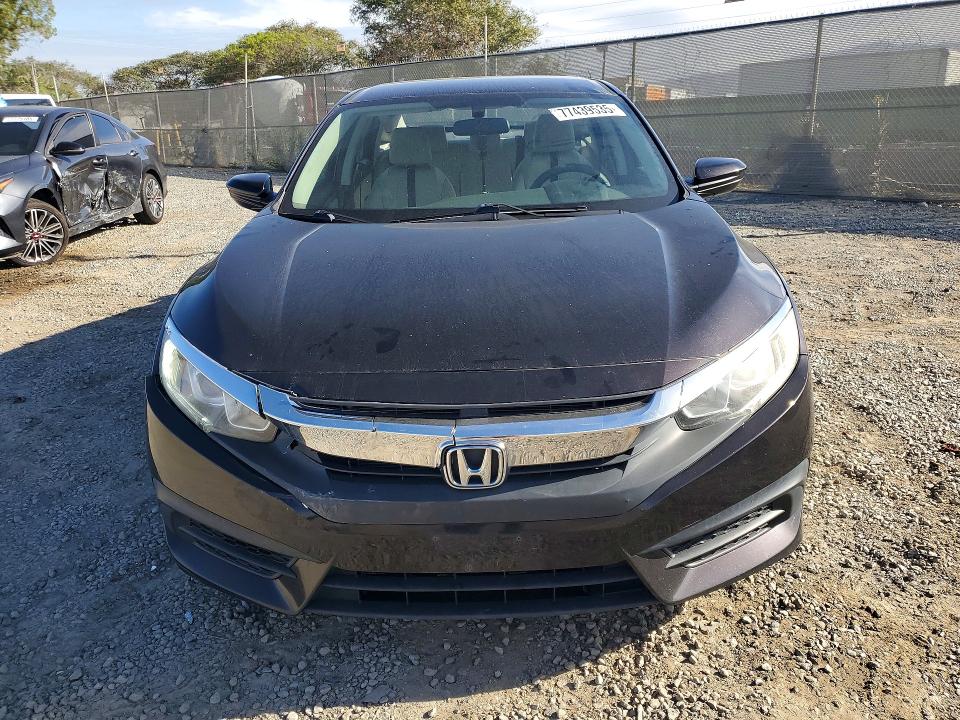 Photo 5 from auction – 2016 HONDA CIVIC LX with VIN 19XFC2F57GE095626
