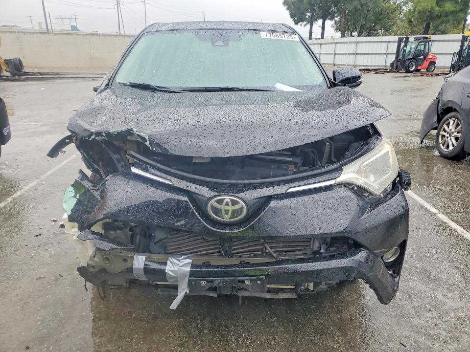 Photo 5 from auction – 2018 TOYOTA RAV4 with VIN 2T3WFREV7JW406906