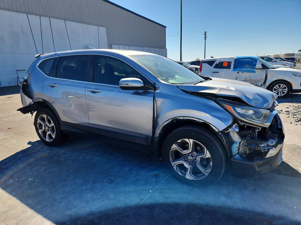 Photo 4 from auction – 2019 HONDA CR-V with VIN 7FARW2H57KE033409