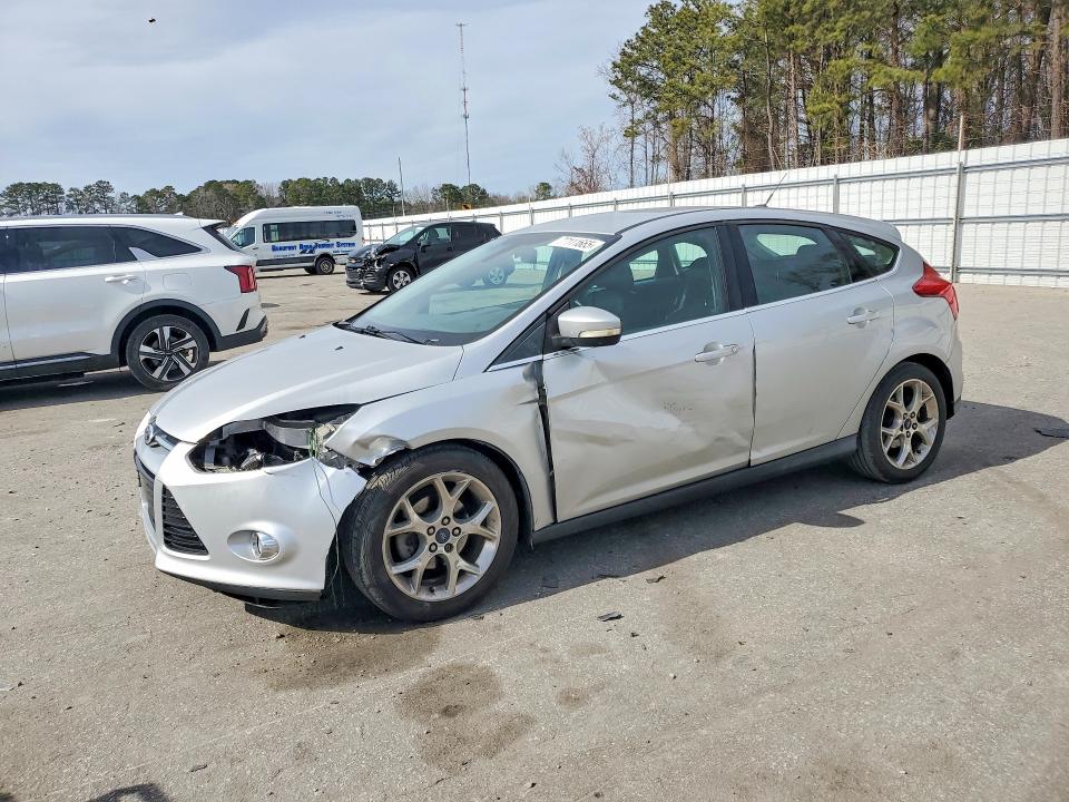 FORD FOCUS 2012 with VIN 1FAHP3M21CL473426 - Photo from auction