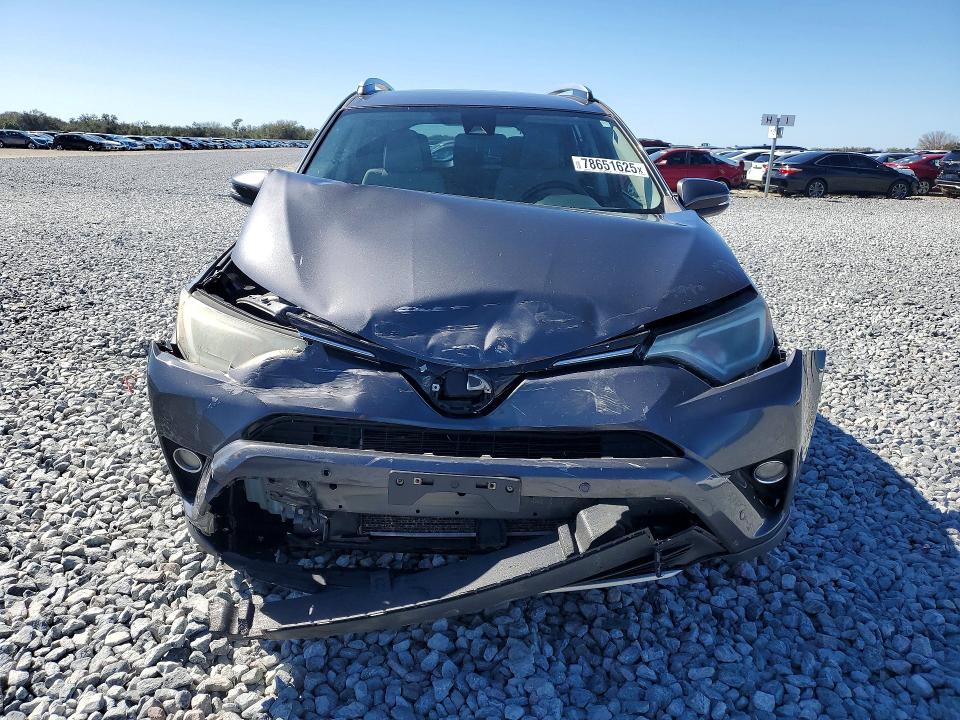 Photo 5 from auction – 2018 TOYOTA RAV4 with VIN JTMWFREV9JJ165848