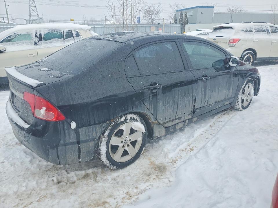Photo 3 from auction – 2009 HONDA CIVIC DX-G with VIN 2HGFA16499H112667