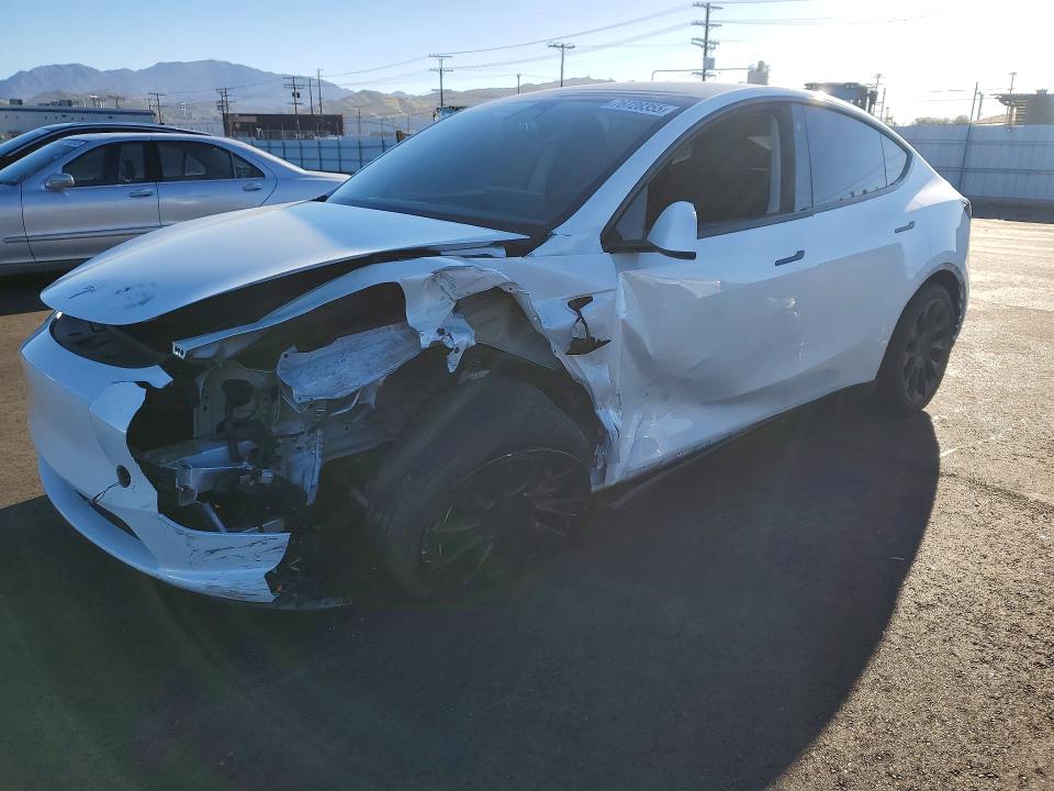 TESLA MODEL Y 2023 with VIN 7SAYGAEE7PF787066 - Photo from auction