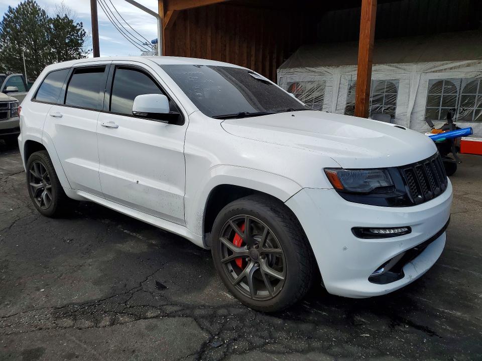 Photo 4 from auction – 2014 JEEP GRAND CHEROKEE with VIN 1C4RJFDJ2EC236536