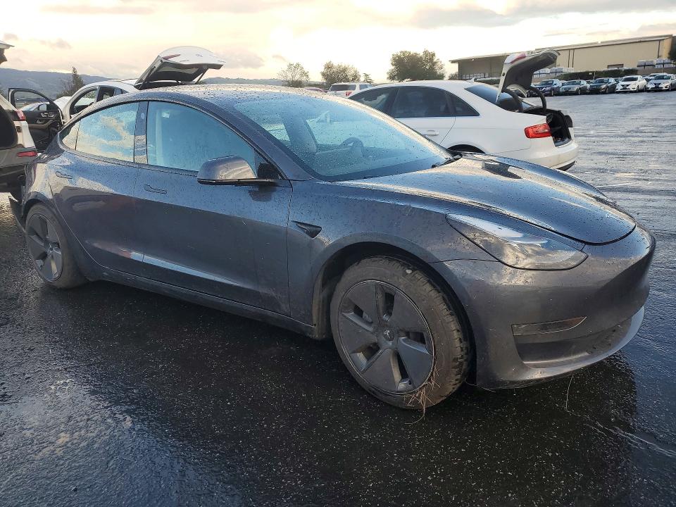 Photo 4 from auction – 2023 TESLA MODEL 3 with VIN 5YJ3E1EA9PF677551